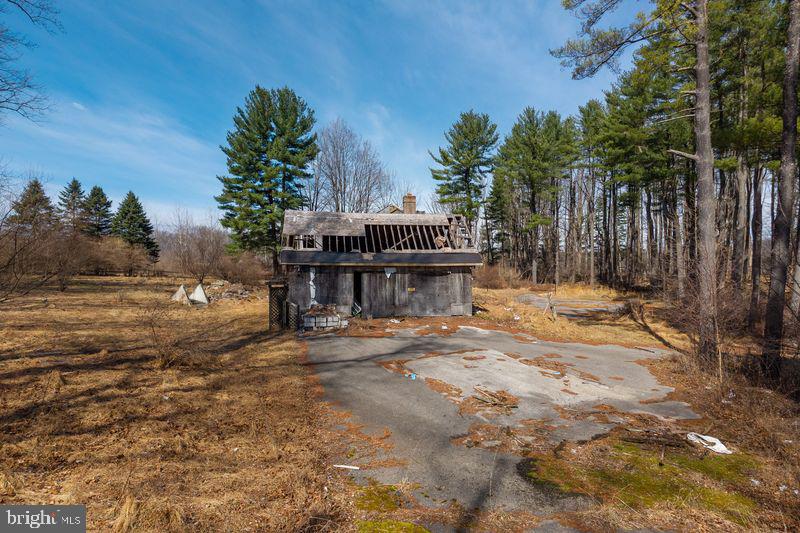 1004 Garrett Mill Road Newtown Square, PA 19073 - Photo 15 of 16 Forgotten home in nature's embrace.