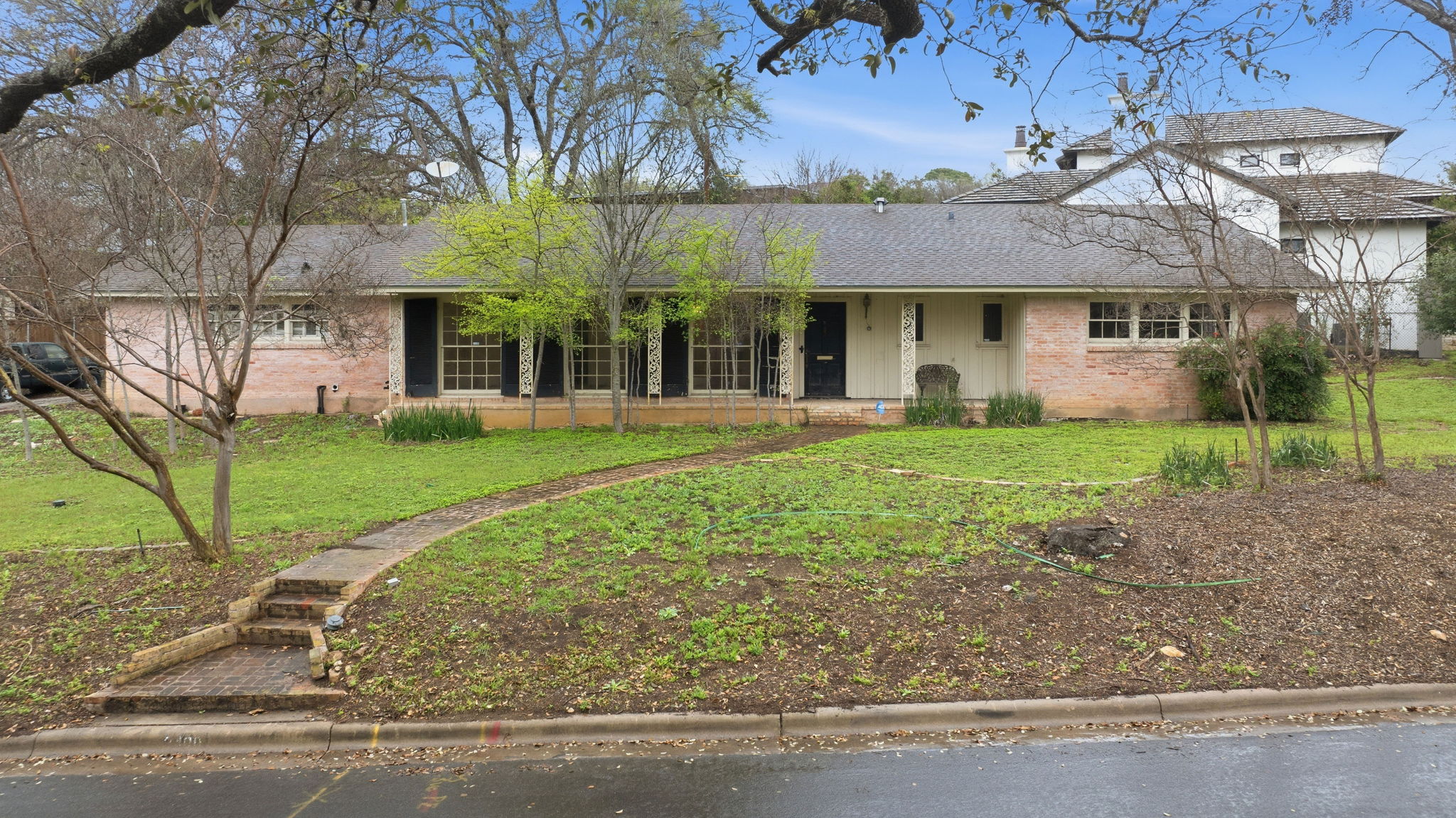 front view of a house with a yard