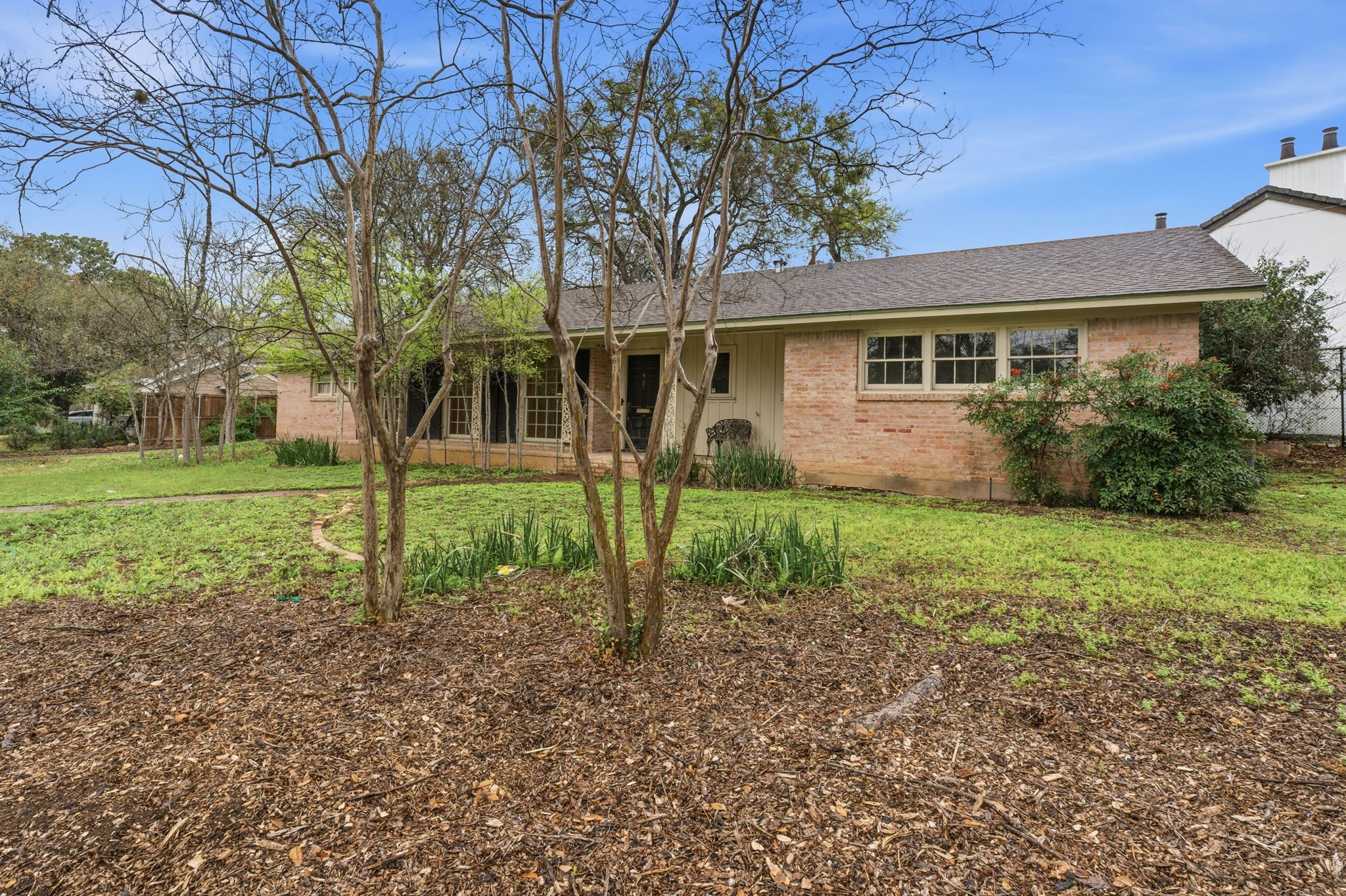 3400 Foothill Parkway Austin, TX 78731 - Photo 15 of 23 a front view of a house with garden