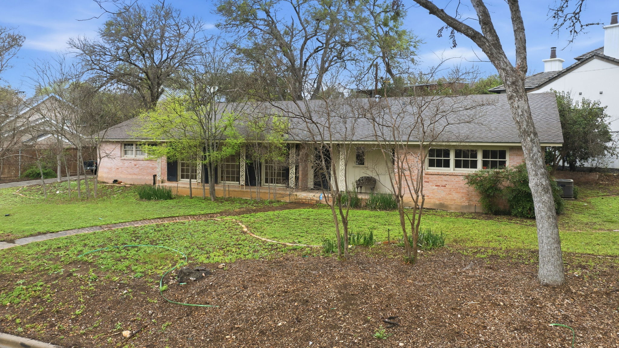 3400 Foothill Parkway Austin, TX 78731 - Photo 23 of 23 a view of a house with backyard and a tree