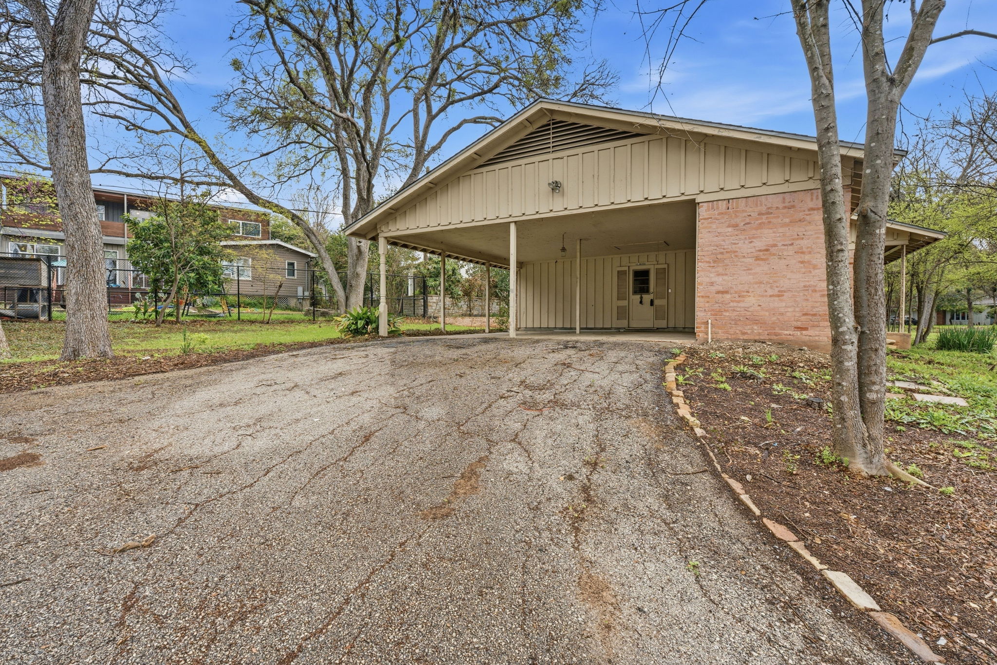3400 Foothill Parkway Austin, TX 78731 - Photo 8 of 23 a front view of a house with garden