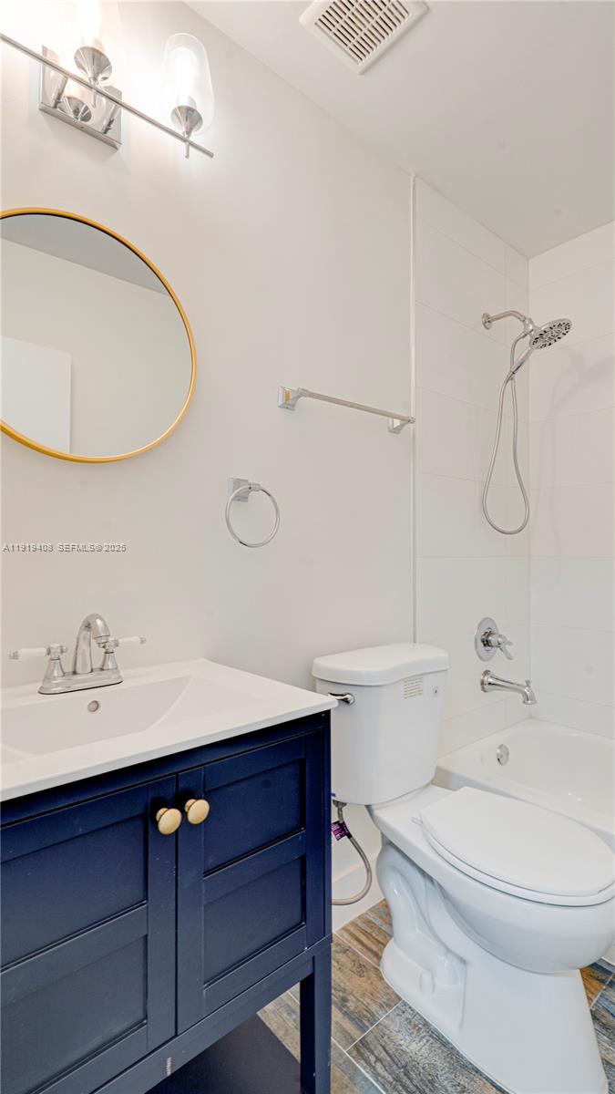 710 Southwest 114th Avenue, Unit C3 Sweetwater, FL 33174 - Photo 21 of 25 a bathroom with a sink a toilet and shower