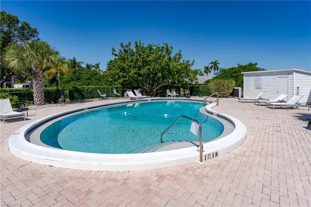 a view of a swimming pool with an outdoor space