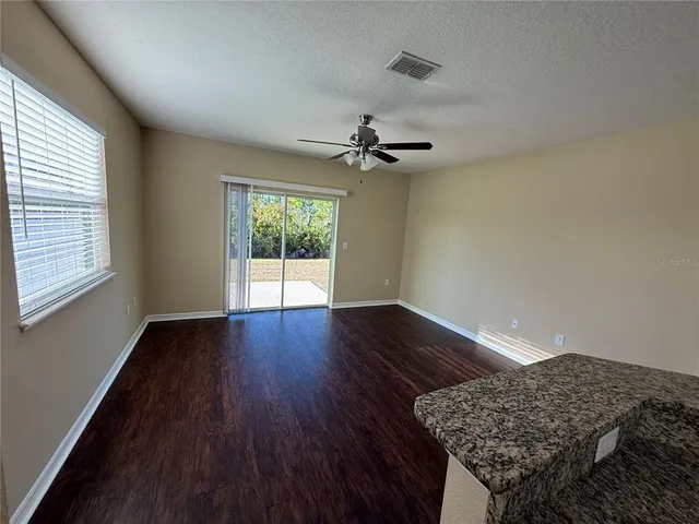 a view of livingroom with furniture and wooden floor