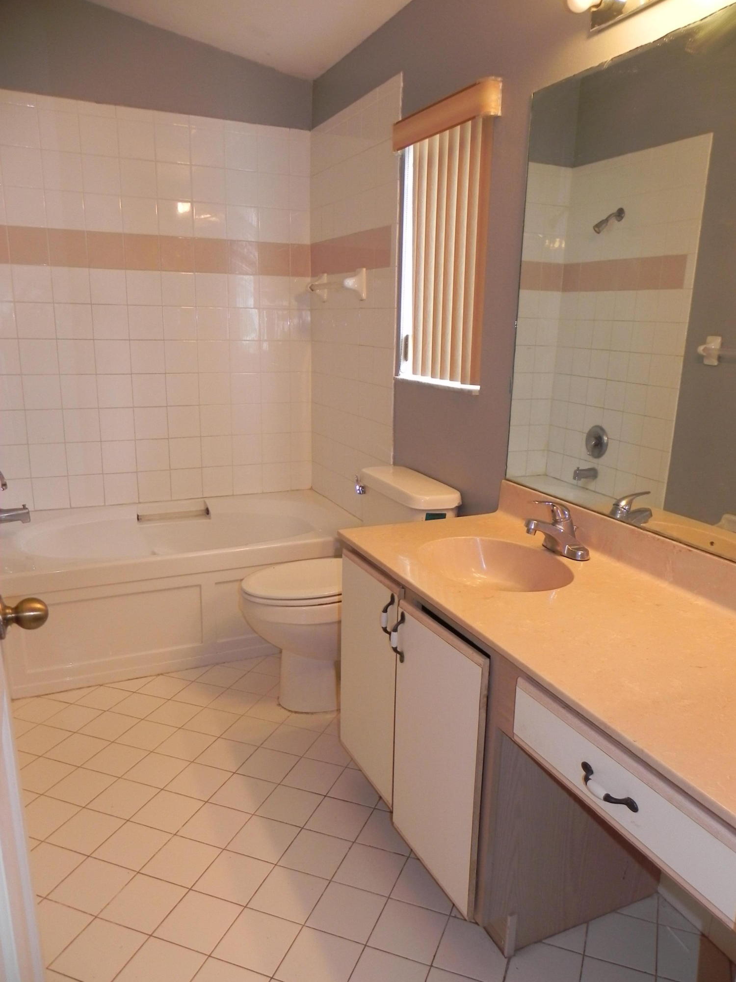 4629 Southwest 12th Street Deerfield Beach, FL 33442 - Photo 28 of 68 a bathroom with a sink a toilet and shower