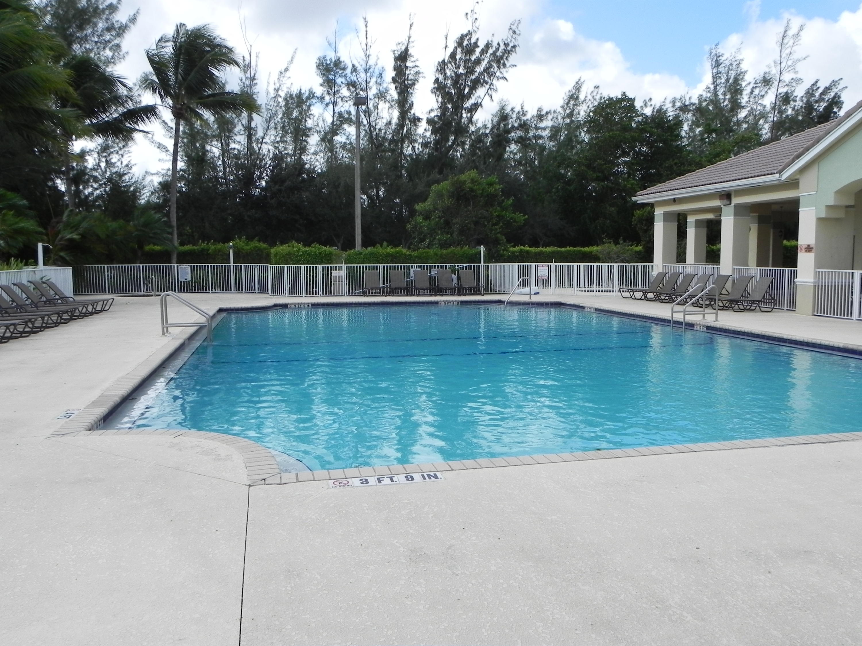 4629 Southwest 12th Street Deerfield Beach, FL 33442 - Photo 59 of 68 a view of a backyard with swimming pool