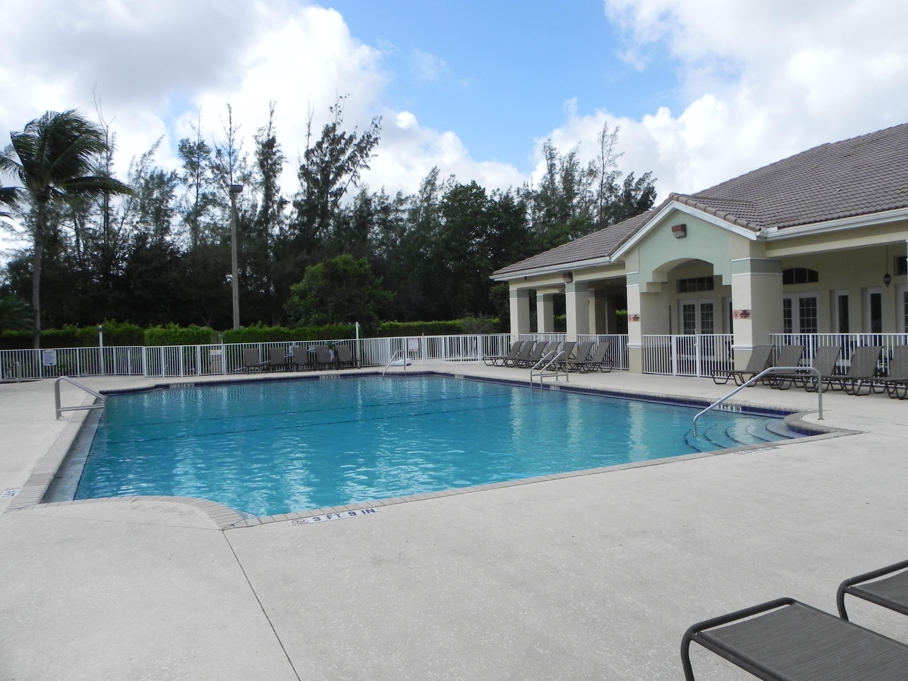 4629 Southwest 12th Street Deerfield Beach, FL 33442 - Photo 60 of 68 a view of a house with swimming pool
