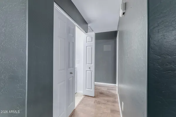 a view of an empty room with a window