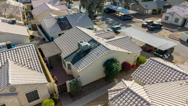 a view of residential houses with outdoor space
