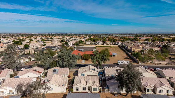 an aerial view of a city with lots of residential buildings