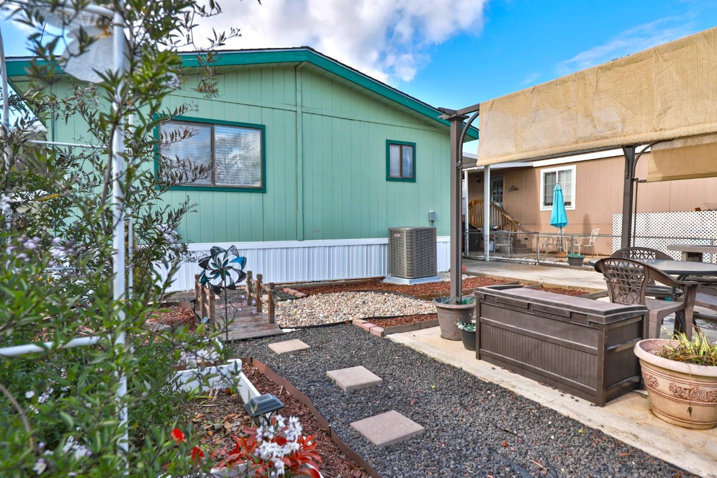 11662 North Ham Lane, Unit 62 Lodi, CA 95242 - Photo 24 of 25 a backyard of a house with outdoor seating