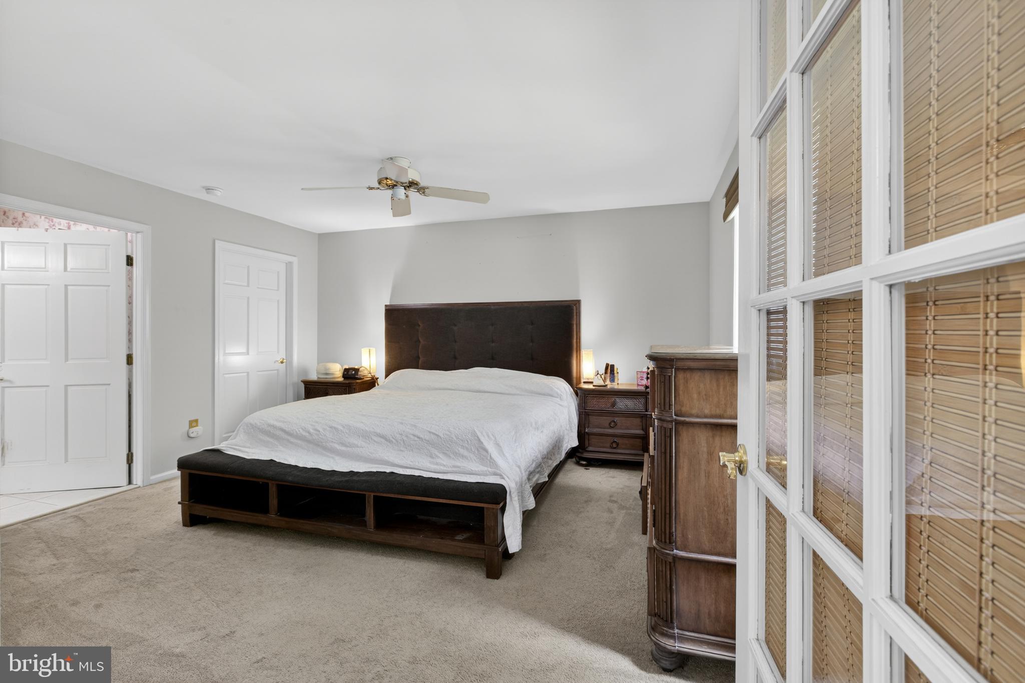 216 Revere Road Marlton, NJ 08053 - Photo 15 of 47 a spacious bedroom with a bed and a window