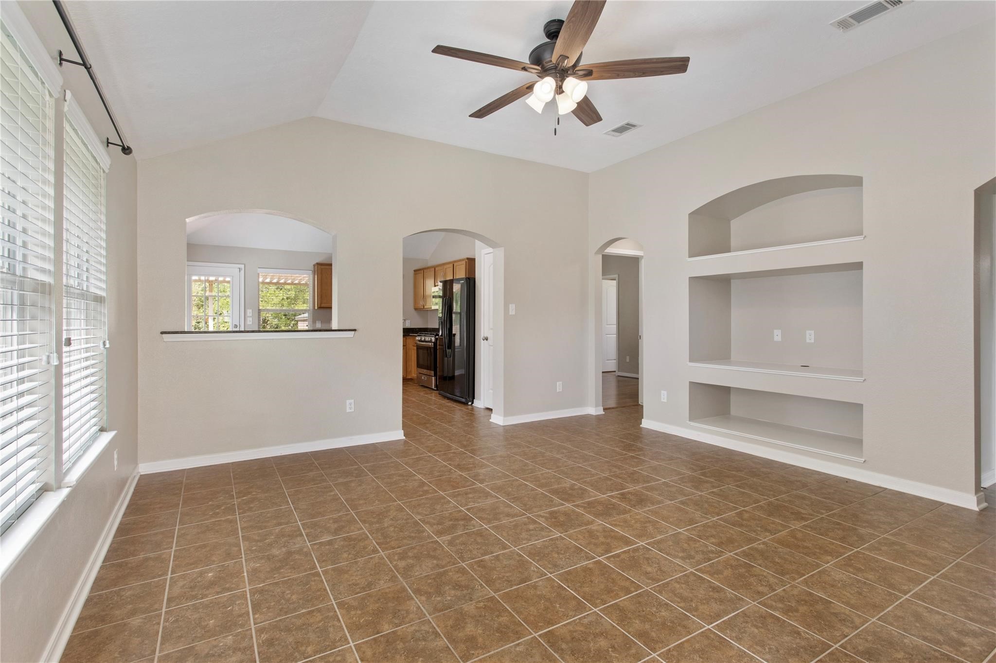 2023 Mountain Wind Loop Bryan, TX 77807 - Photo 3 of 16 a view of an empty room with a bathroom