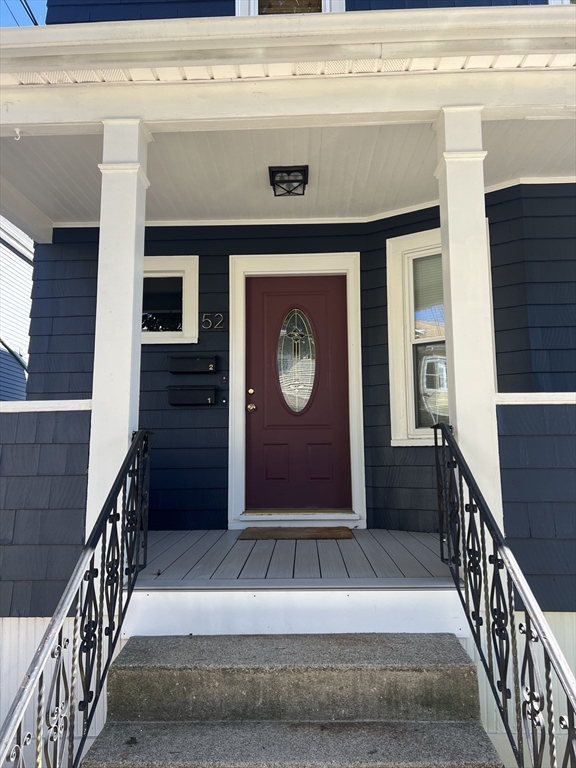 52 Victoria Street, Unit B Somerville, MA 02144 - Photo 1 of 15 a front view of a house