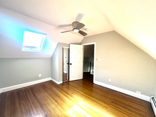 a view of a livingroom with wooden floor