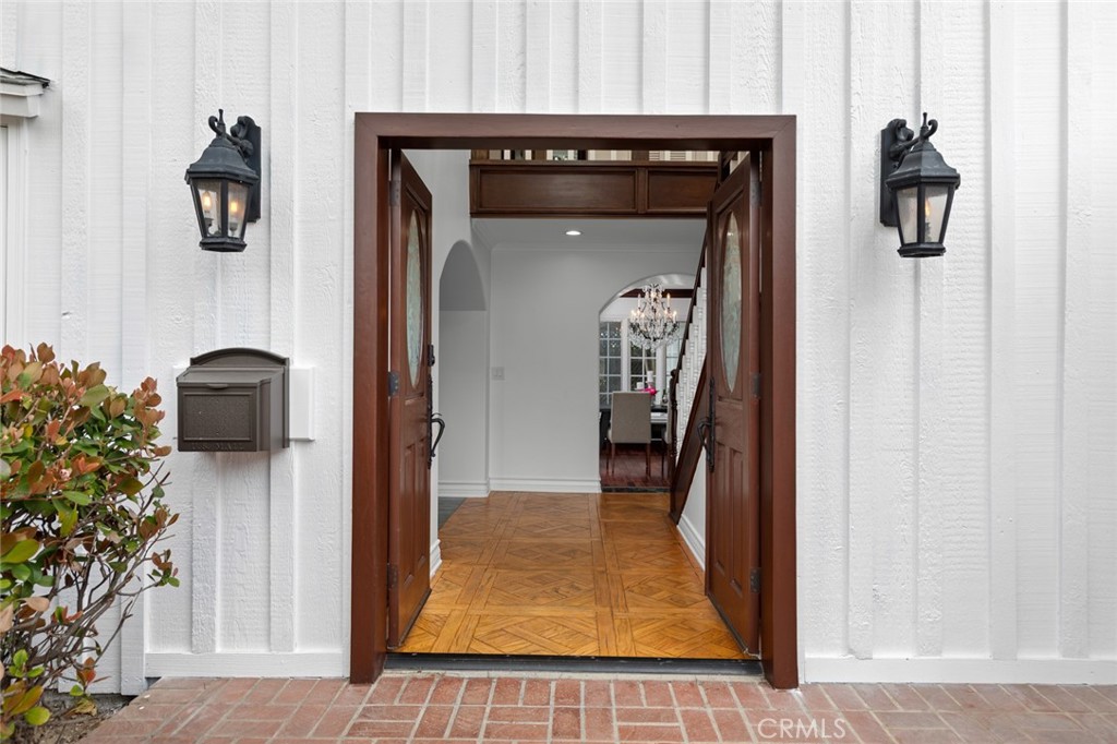16842 Harkness Circle Huntington Beach, CA 92649 - Photo 15 of 43 a view of a hallway with a flower pot