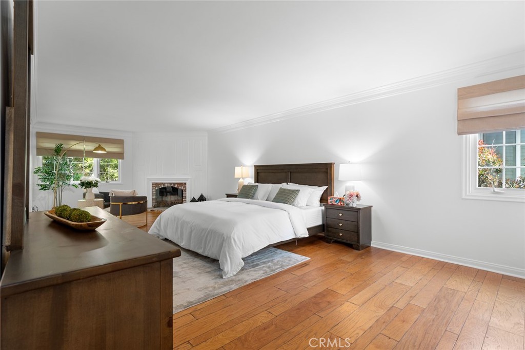 16842 Harkness Circle Huntington Beach, CA 92649 - Photo 37 of 43 a bedroom with double bed and a window