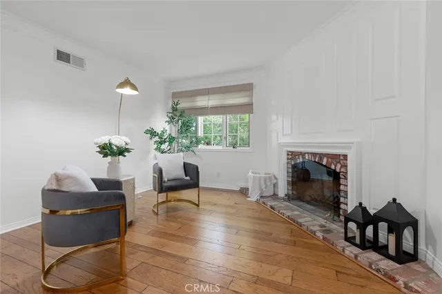 a bedroom with a bed and a lamp