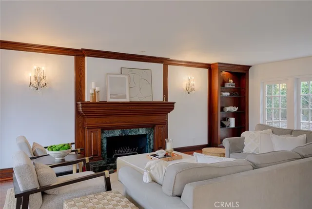 a bedroom with a bed and a fireplace