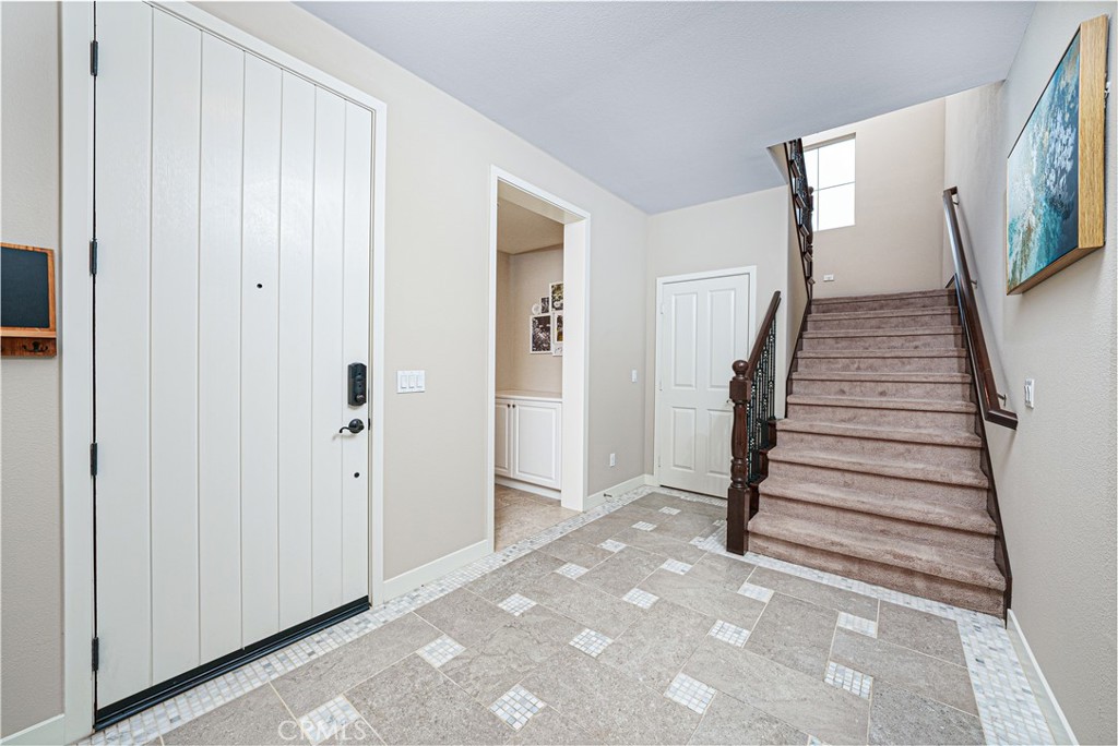 106 Tinker Irvine, CA 92618 - Photo 23 of 36 a view of a entryway with stairs