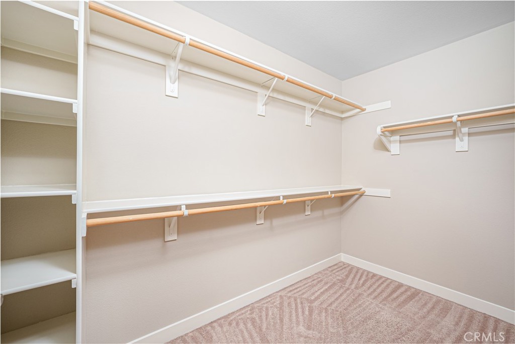 106 Tinker Irvine, CA 92618 - Photo 26 of 36 a view of a room with racks on the wall