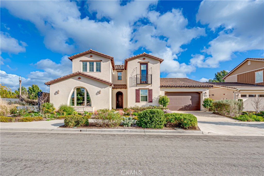 106 Tinker Irvine, CA 92618 - Photo 3 of 36 front view of a house with a street