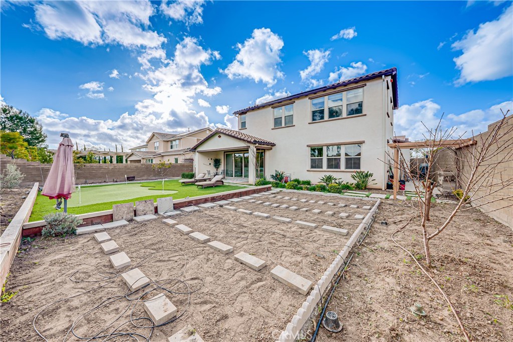 106 Tinker Irvine, CA 92618 - Photo 9 of 36 a view of an house with backyard and a patio