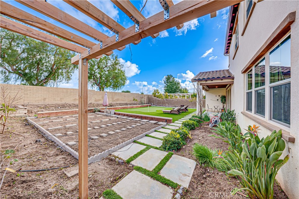 106 Tinker Irvine, CA 92618 - Photo 10 of 36 a front view of a house with garden