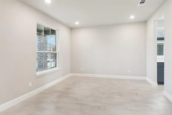 an empty room with windows