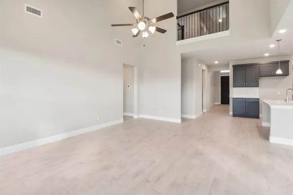 a view of a livingroom with a ceiling fan