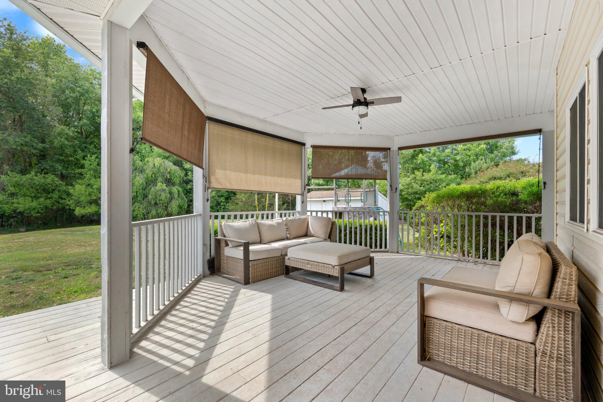 836 Hardingville Road Monroeville, NJ 08343 - Photo 34 of 57 Serene deck with roof and lush green views.