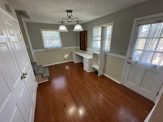 a view of walk in closet with window