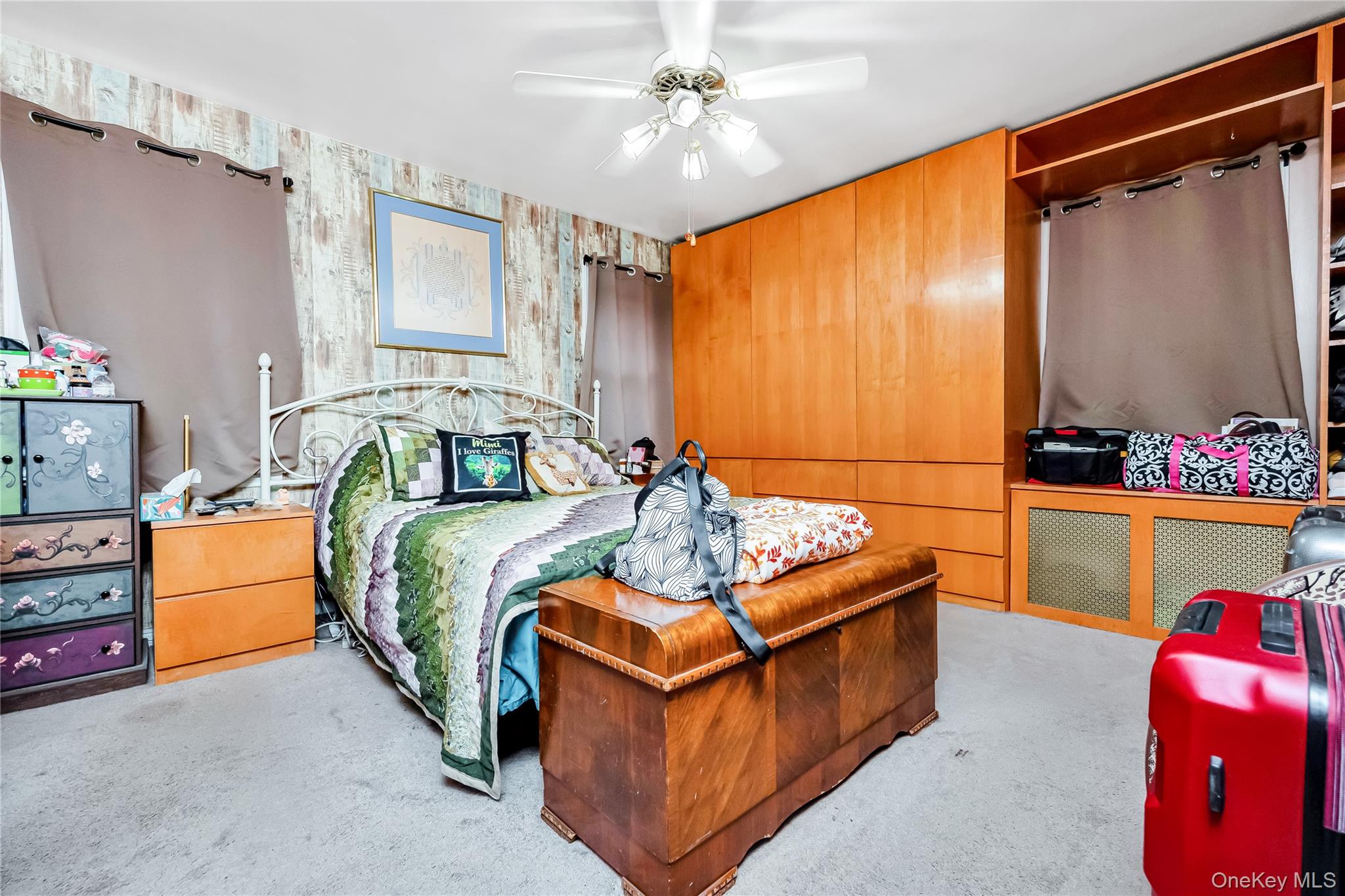 65-32 170th Street Queens, NY 11365 - Photo 11 of 24 a bedroom with bed and window