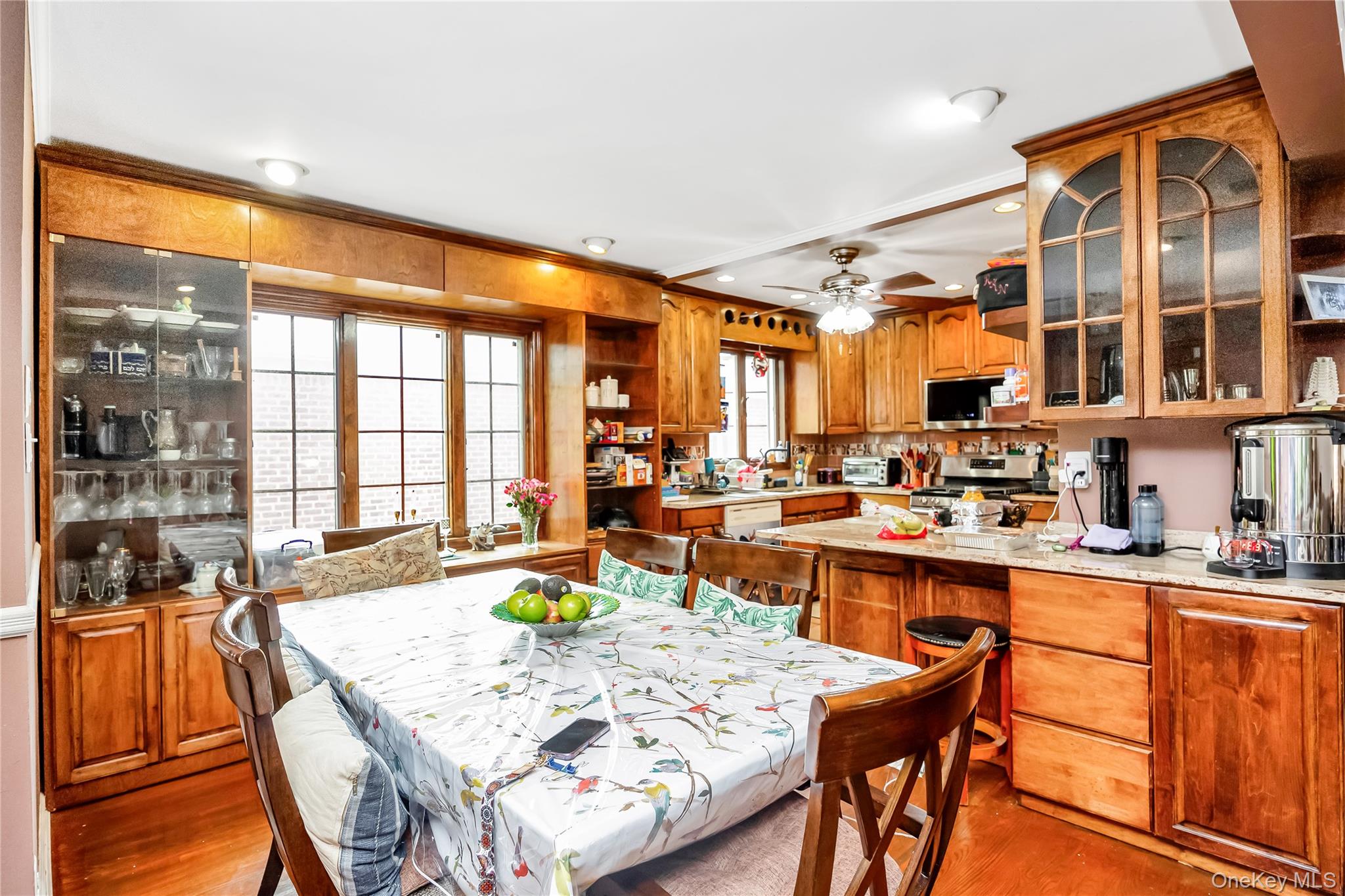 65-32 170th Street Queens, NY 11365 - Photo 7 of 24 a large kitchen with a table and chairs