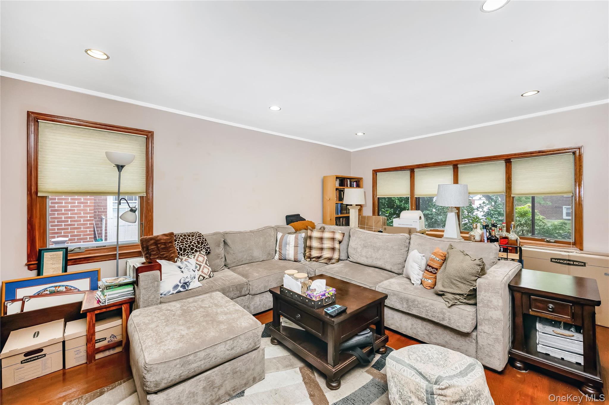 65-32 170th Street Queens, NY 11365 - Photo 9 of 24 a living room with furniture and a large window