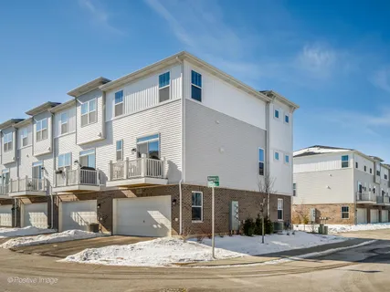 a front view of a building with street view