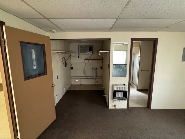 a view of hallway with washer and dryer