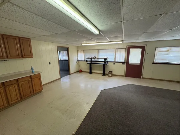 a view of a livingroom with furniture and window