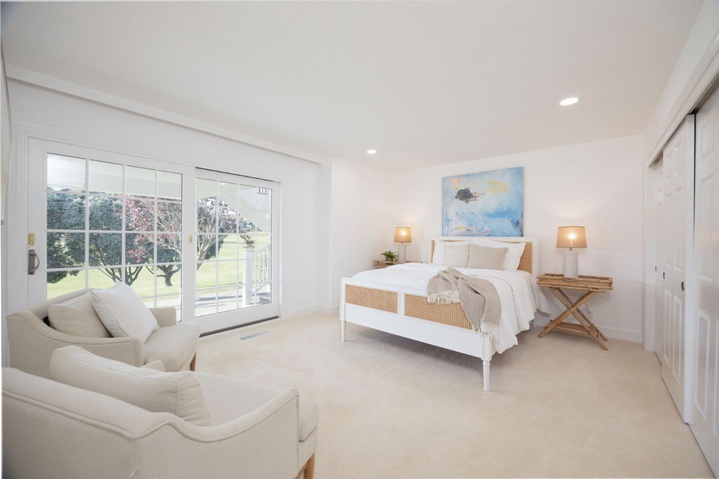 3 Ashdown Place Half Moon Bay, CA 94019 - Photo 18 of 31 a bedroom with a bed and glass window