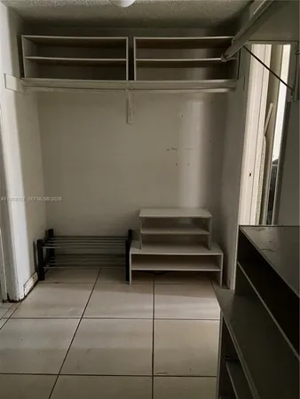 a view of entryway with stairs