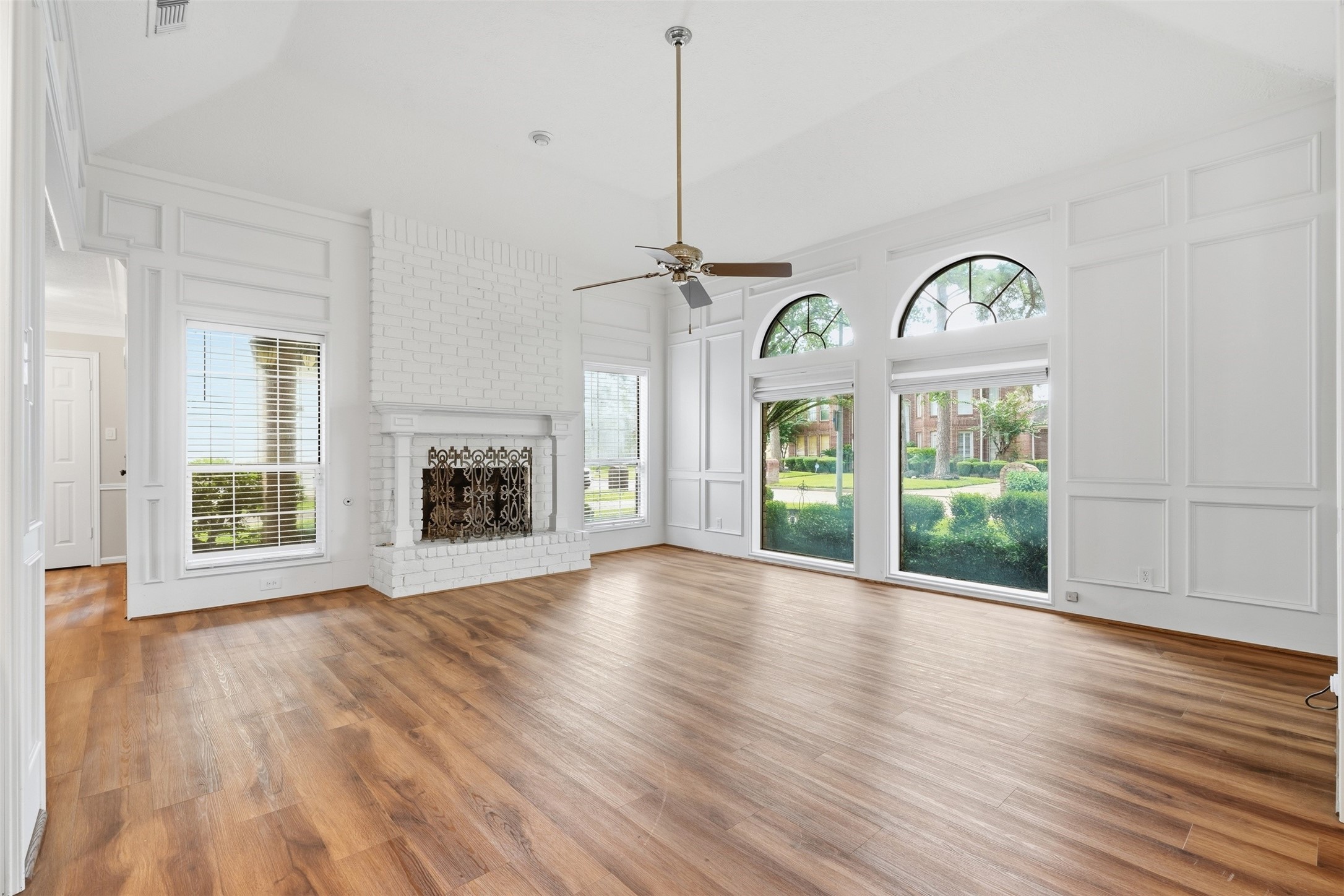 8310 Mentmore Drive Spring, TX 77379 - Photo 9 of 47 Thoughtfully designed for both comfort and functionality, this inviting living room serves as the heart of the home.