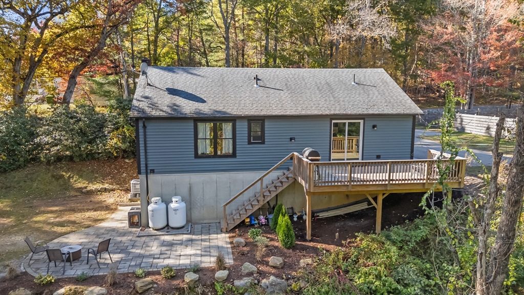 89 River Road Sturbridge, MA 01566 - Photo 29 of 31 a view of a house with pool and chairs