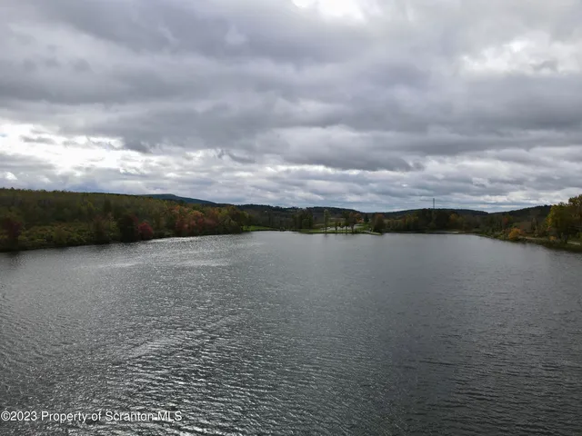 a view of a lake from a yard