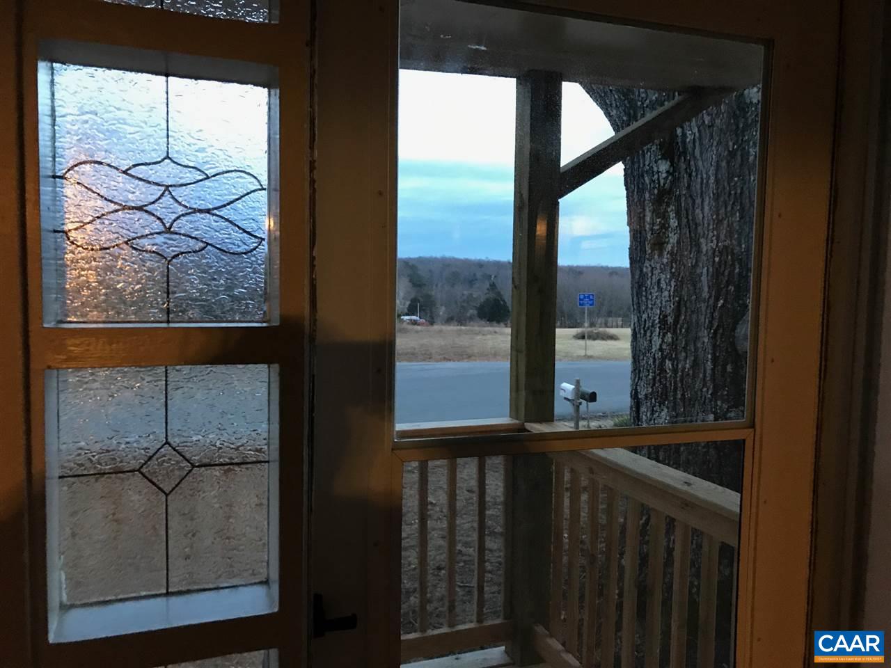 1129 Bybees Church Road Palmyra, VA 22963 - Photo 3 of 14 a view of a glass door with a balcony from a window