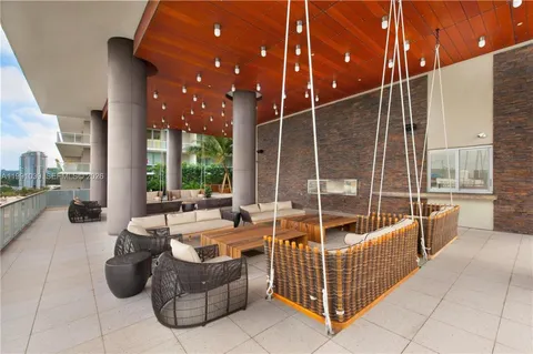 a outdoor space with patio furniture and a potted plant