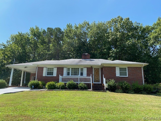 6430 Plank Road Kenbridge, VA 23944 - Photo 4 of 34 a front view of a house with a yard