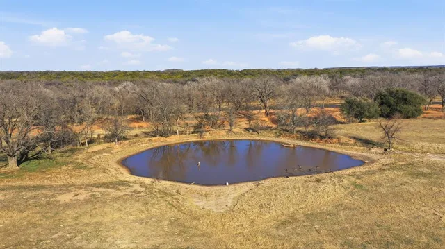 a view of a swimming pool with mountain view