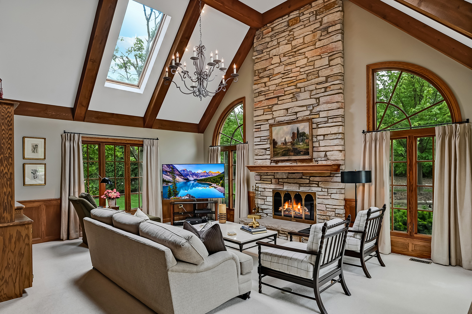2 Hampton Court Burr Ridge, IL 60527 - Photo 16 of 38 a living room with furniture fireplace and a large window