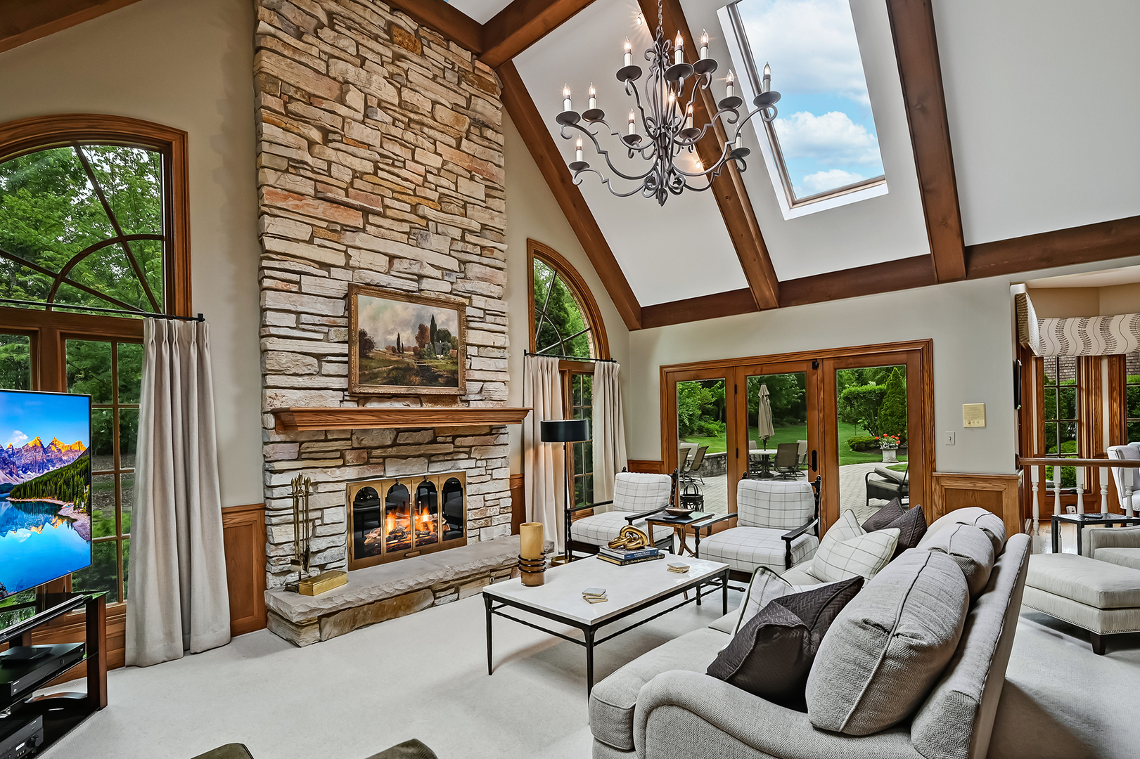 2 Hampton Court Burr Ridge, IL 60527 - Photo 17 of 38 a living room with furniture and a fireplace