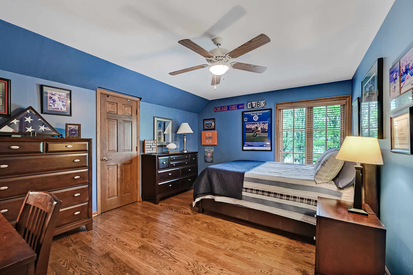 2 Hampton Court Burr Ridge, IL 60527 - Photo 25 of 38 a bedroom with a bed window and dresser